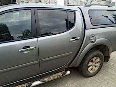 Съемная 25% тонировка  задних дверей в Mitsubishi L200