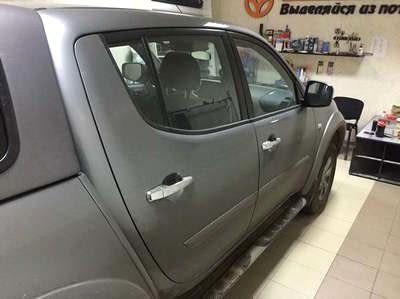 Съемная 25% тонировка  задних дверей в Mitsubishi L200